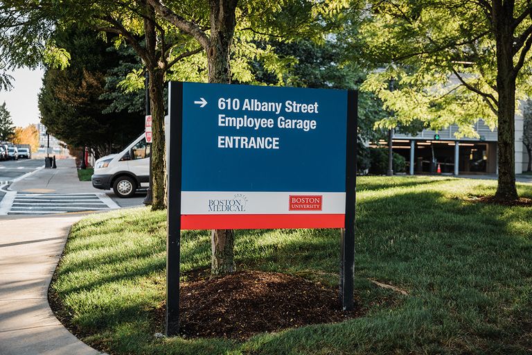 610 Albany Street Parking Garage sign
