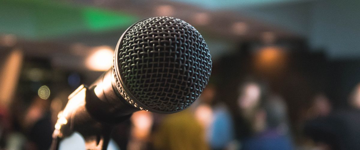 Single microphone on blurry background