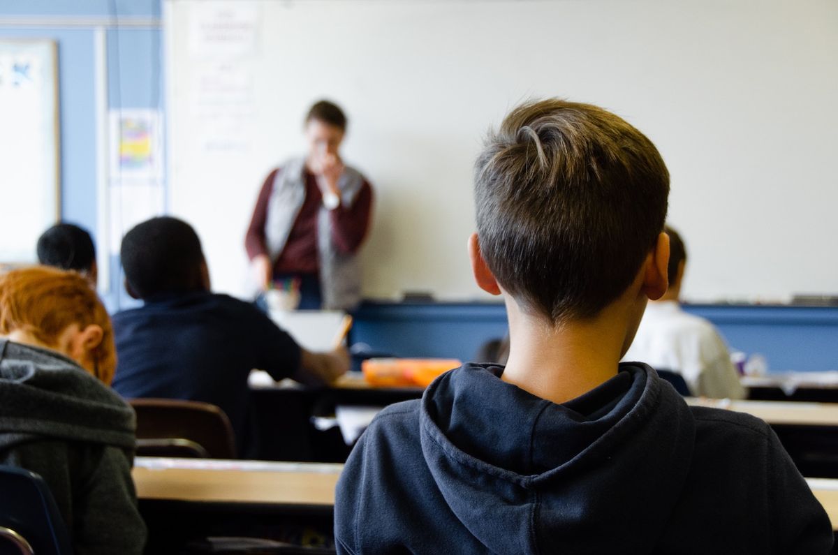Young boy in class