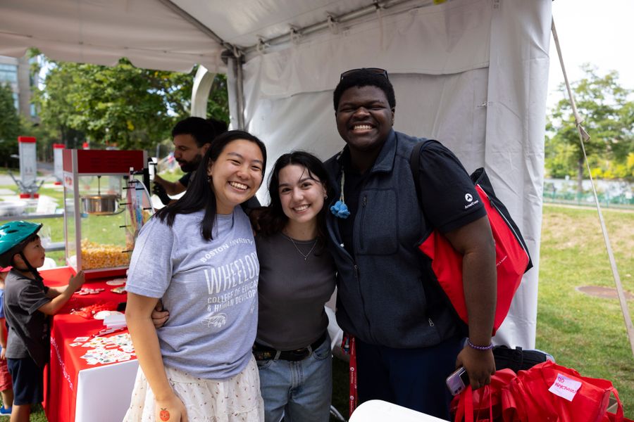Wheelock Students smiling at the BU Beach
