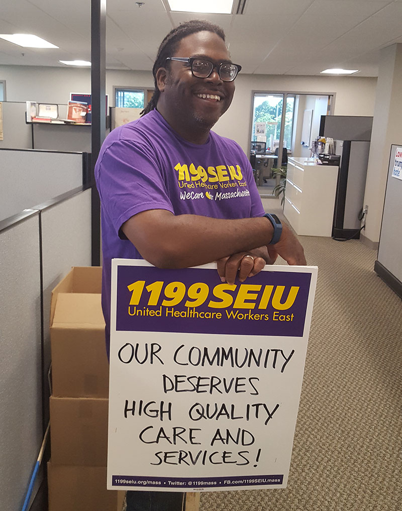 Allen Jackson with sign