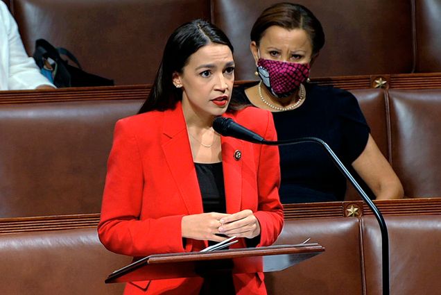A photo of Rep. Alexandria Ocasio Cortez speaking on the House floor