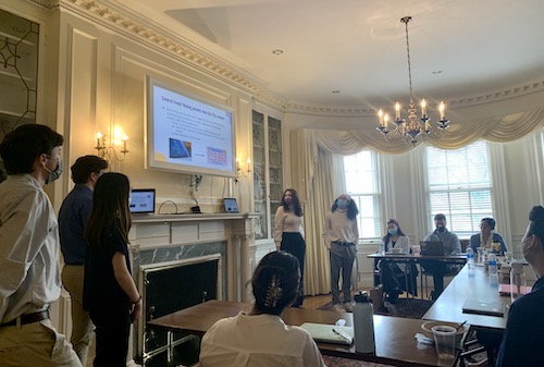 students presenting their work at the IOC