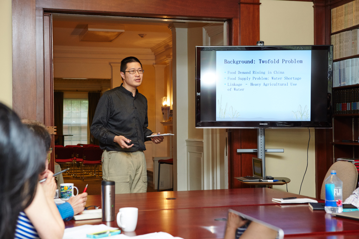 Summer Fellow Junda Jin presents his paper.