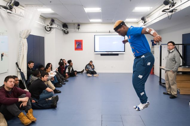 4/6/17 -- Boston, MA Malaky Lewis, a freshman at MMalaky Lewis, a freshman at Match Charter School, helps show how state-of-the-art equipment in the Movement and Applied Imaging Lab at Sargent can track and measure human motion.
