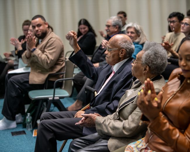 Hubie and Katherine Jones with lecture crowd