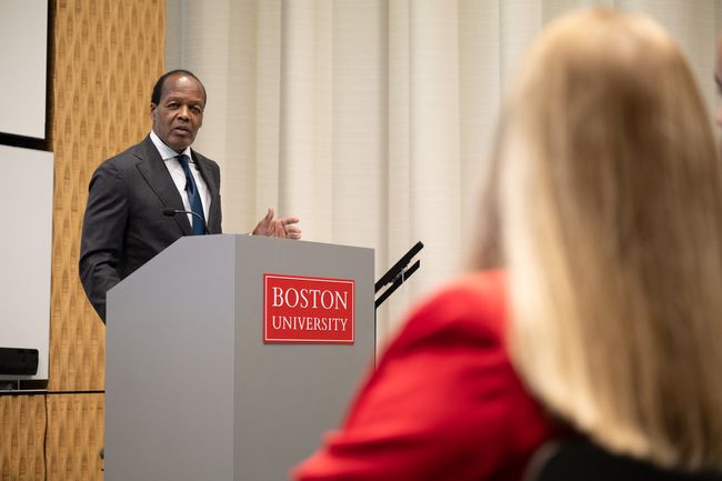 Photo of Lee Pelton speaking at a podium during the 2024 Hubie Jones Lecture in Urban Health