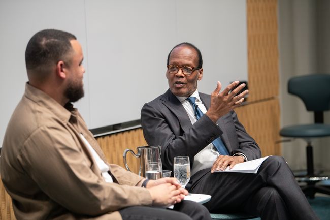 2 lecturers conversing